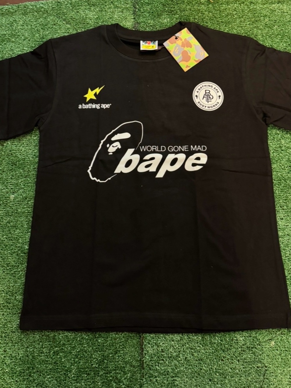 Bape Black Kids' 'World Gone Mad' Graphic Tee with Yellow Accent